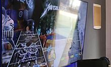 Friends play guitar hero then make out and suck each other