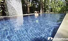 hot babe swims naked and grabs my cock by the pool