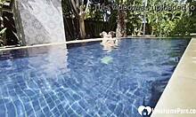 hot babe swims naked and grabs my cock by the pool