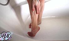 teen masturbates pussy in bathroom under water