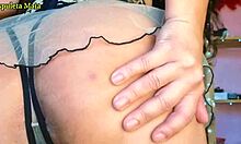 beautiful brunette shows off in lingerie while dancing solo