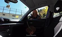 brunette negotiates taxi fare with intimate payment