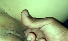 Amateur gives massage to naked wife, leading to gentle masturbation.