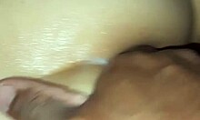 Amateur gives massage to naked wife, leading to gentle masturbation.