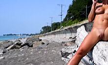 beautiful blonde queen sucks candy nude on public beach. Slow motion heat! 😜