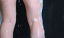 college babes lather up in a steamy shower with big bouncing assets