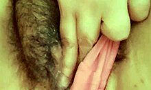 Mature milf in lingerie watches porn while touching her natural tits and pussy