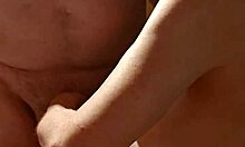 Cougar wife teases tits with sensual handjob.