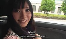 Japanese Teen Enjoys a Ride on the Car