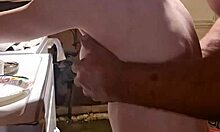 Cougar wife teases tits with sensual handjob.