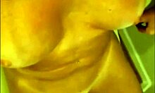 Busty tranny strokes her cock and cums in playful session