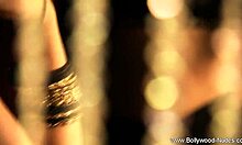 brunette in black dress solo