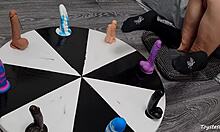 She Spins The Wheel Of Dildos For Her Orgasm