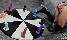 She Spins The Wheel Of Dildos For Her Orgasm