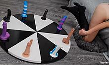 She Spins The Wheel Of Dildos For Her Orgasm