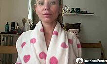 Busty milf teases with toys in see-through outfit