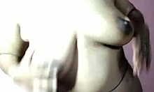 Indian girl masturbating on bed with big natural tits.