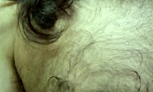 Muscular hairy guy rips clothes to show off body outdoors