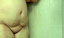 Shower tease with natural tits and big ass