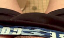 A young Japanese amateur girl indulges in solo masturbation in her private room, exploring her body with gentle touches.