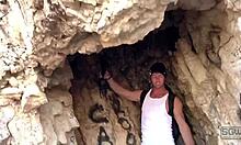 Feeling the rush of an outdoor blowjob in a public cave with a monster cock