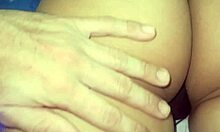 athletic ex-girlfriend gets buttocks massaged in oiled leggings at party bathroom.