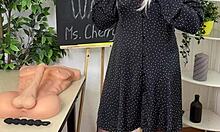 Beautiful woman in stockings and glasses engages in solo wanking