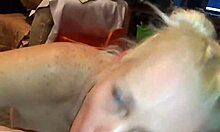 The big ass milf stepmom sucked his cock and licked his balls, flaunting her huge tits before returning to deepthroating him.