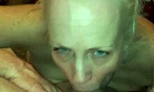 The big ass milf stepmom sucked his cock and licked his balls, flaunting her huge tits before returning to deepthroating him.