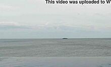 beautiful skinny asian college girl with ponytail relaxing at infinity pool