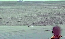 beautiful skinny asian college girl with ponytail relaxing at infinity pool