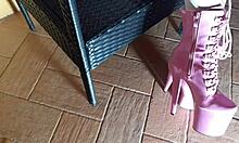 Latina milf sits on chair in pantyhose and high heeled boots, looking sexy