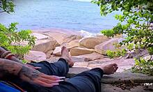 amateur african handjob leads to surprise cum on public beach.