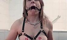 i watchs this homemade milf slut in bdsm humiliation with harness and candle