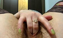 hot brunette masturbates hairy pussy to orgasm on table