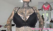 Melody Radford tries on black and purple lingerie and micro bikini in her haul.