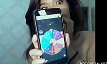 hot asian girl teases with masturbation on webcam