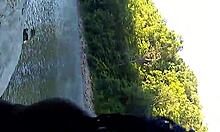 Interracial Couple Engages In Public Bent Over Doggystyle And Blowjob