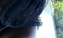 Interracial Couple Engages In Public Bent Over Doggystyle And Blowjob