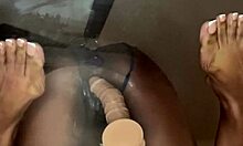 ebony slut takes dildo deep in pussy on desk with best friend