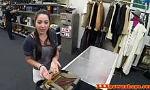 amateur student negotiates with pawnroker for cash on desk