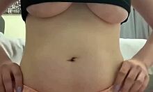 Amateur stuffs panties in wet puffy pussy.