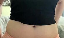 Amateur stuffs panties in wet puffy pussy.