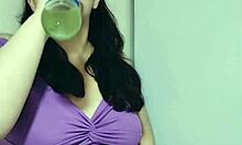 Nicole's teasing with her saggy tits before stuffing her stomach – intriguing contrast.