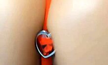 hot brunette teasing with titsfuck and butt plug anal