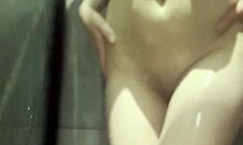 Girlfriend Shows Off Shaved Pussy in Shower Play