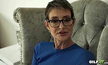 In this scene, a mature grandmother with short hair and a teen named Gabie engage in lesbian hardcore, cumming together with a dildo.