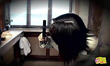 Wonderful Kelly Bell and her friend share a relaxing moment in the bathroom.