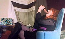 Sexy red-headed transsexual swallows 8-inch vibrating dildo