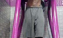 skinny pretty girl uses workout machine at the gym